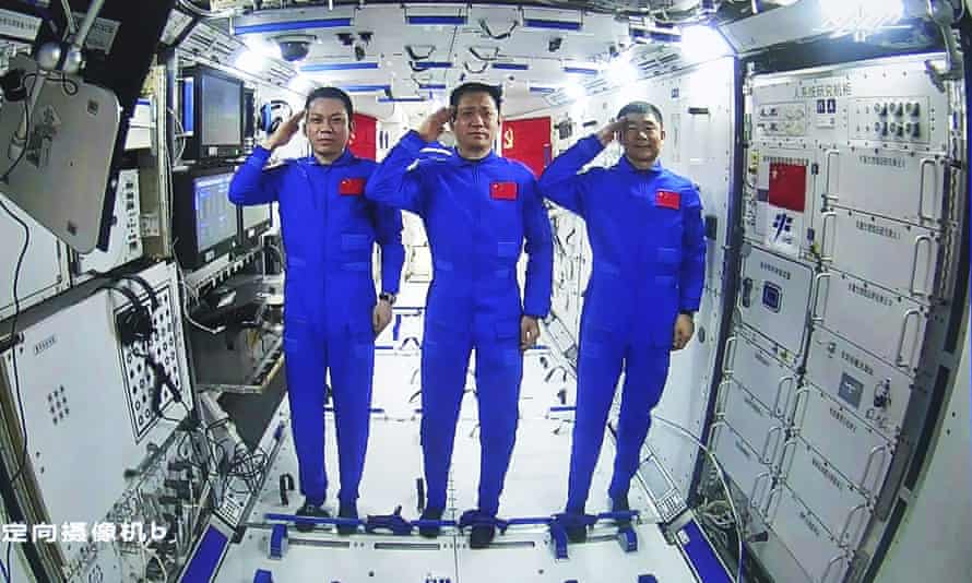 The astronauts onboard the station