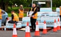 South West Water workers handing out emergency rations of bottled water to residents affected by the cryptosporidium outbreak in south Devon in May. 