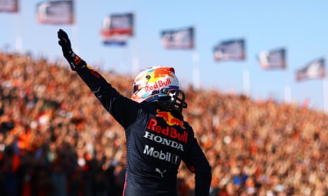 Max Verstappen salutes his fans after taking pole position at Zandvoort.