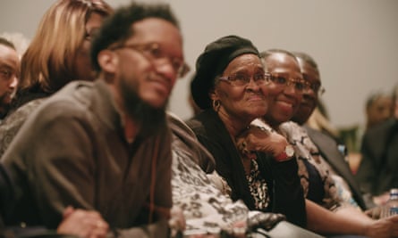 People sit smiling