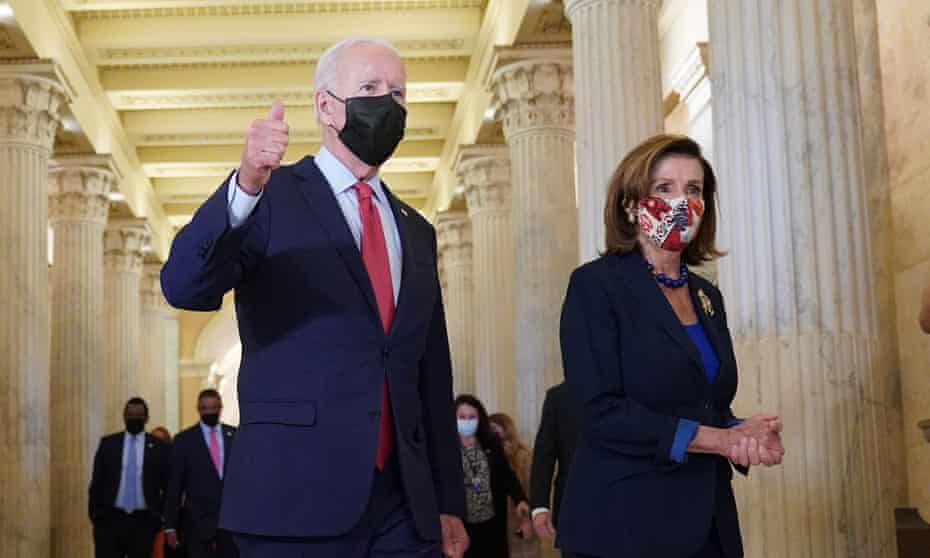 Joe Biden with Nancy Pelosi on Friday.