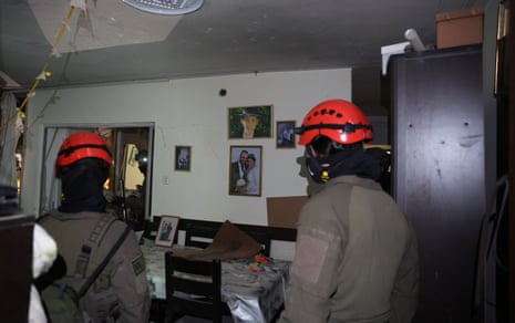 Israeli security, rescue, and paramedics in Arad, Israel, following an Iranian missile on Saturday.