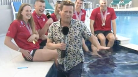 BBC presenter Mike Bushell falling into swimming pool – video