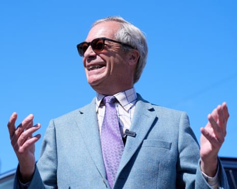 Farage smiling in sunglasses