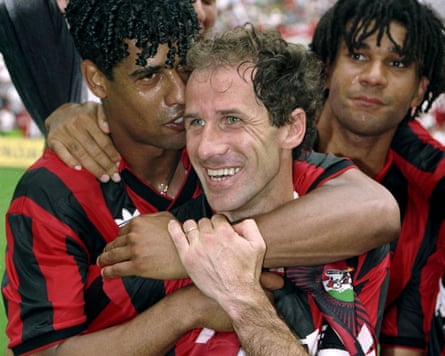 Franco Baresi celebrates winning the Serie A title with Milan in 1993 alongside Frank Rijkaard and Ruud Gullit