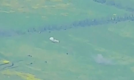 Drone footage shows armoured vehicles on the move in an unidentified location in footage released by the Defence Ministry in Moscow.