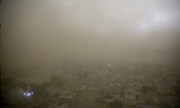 Dust from a storm covers the horizon on the outskirts of New Delhi, India, Saturday, June 9, 2018.