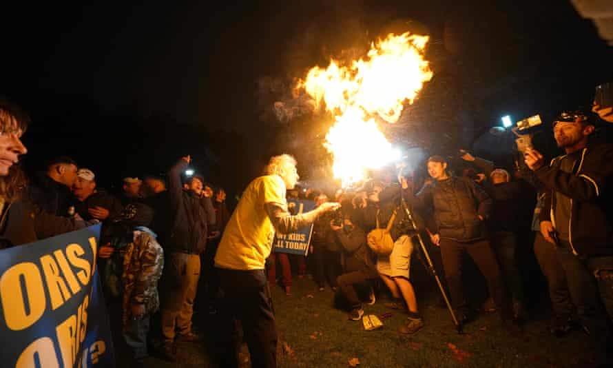 Piers Corbyn performing a fire-eating act