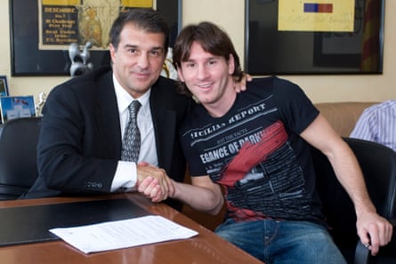 Joan Laporta with Leo Messi after the forward signed a contract extension in 2009.