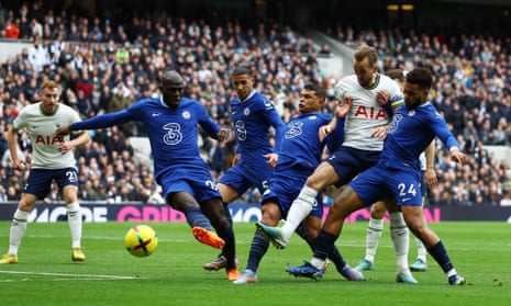 Harry Kane tries to sneak past the Chelsea defence.