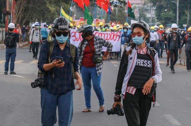 The 74 Media photographers coving a protest. Reporting on a subsequent demonstration, some reporters had their cameras and phones confiscated.