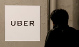 A man arrives at the Uber offices in Queens New York