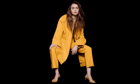 ‘I enjoy playing characters who seem like they are barely keeping it together’: Lily Collins wears shirt and jacket by Christopher Esber. Styling by Danielle Nachmani at the Wall Group; hair by DJ Quinteroc; and makeup by Vincent Oquendo at the Wall Group.