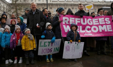 Alf Dubs, centre left, with protesters in London last year.