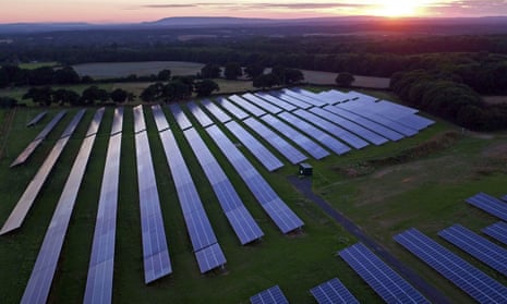 Solar panels in a field near Five Oaks, West Sussex.