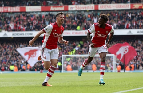 Arsenal’s Granit Xhaka celebrates scoring their third goal with fellow goalscorer Nuno Tavares.