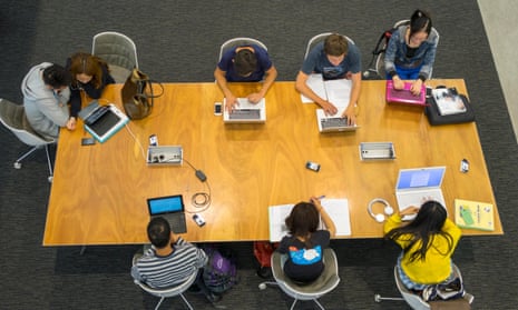 Stock image of university students in a library