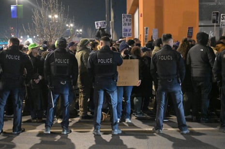 Demonstrators and community members gather in Chicago's Little Village neighborhood on January 7, 2026, in Chicago, Illinois.