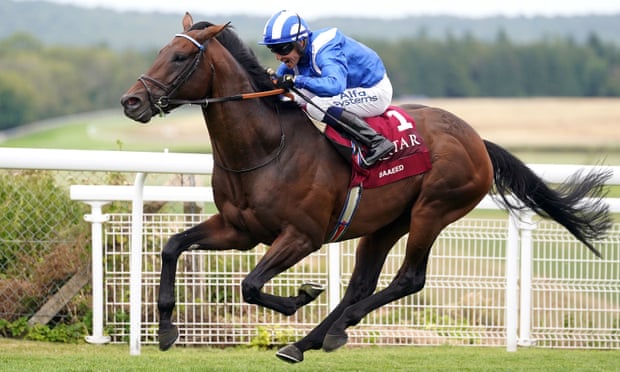 Baaeed, ridden by jockey Jim Crowley, wins the Sussex Stakes at Goodwood.