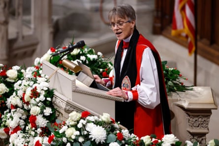 A bishop wearing glasses delivers a sermon at a pulpit