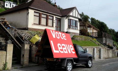 A sign is displayed opposite the M4 near Tata Steel works, on the day of the EU referendum, in Port Talbot in Wales
