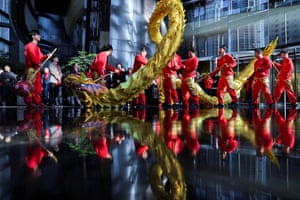 Shanghai, ChinaDragon dancers perform in the lobby of the Shanghai Tower in the Pudong financial district after workers return from the lunar new year holiday