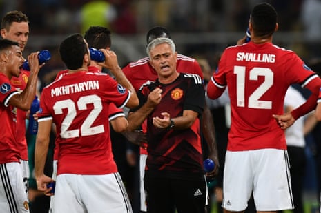 Jose Mourinho issues instructions during the water break.