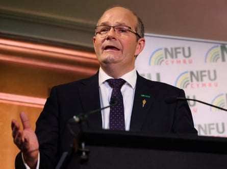Tom Bradshaw, NFU president, speaks into a microphone at an NFU event.