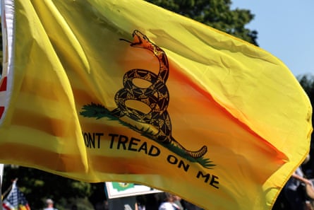 Anti COVID-19 vaccine mandate in Olympia, US - 28 Aug 2021Mandatory Credit: Photo by Toby Scott/SOPA Images/REX/Shutterstock (12381489a) A yellow flag with a snake at a protest against a recently imposed COVID-19 vaccine mandate for some public employees in the state of Washington. Anti COVID-19 vaccine mandate in Olympia, US - 28 Aug 2021