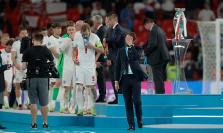 Gareth Southgate leads the way as England collect their runners-up medals.
