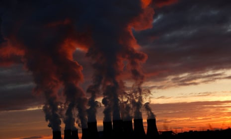 Smokestacks at the Drax power station, in North Yorkshire, at sunset