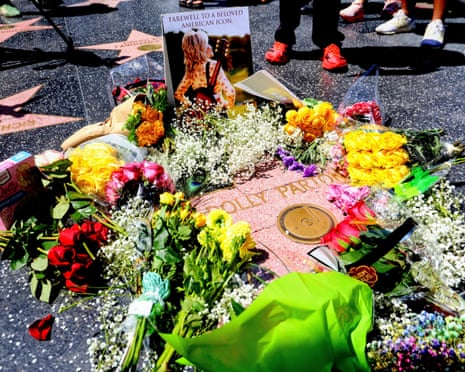 Flowers laid on Dolly Parton’s star on the Hollywood Walk of Fame following her death.