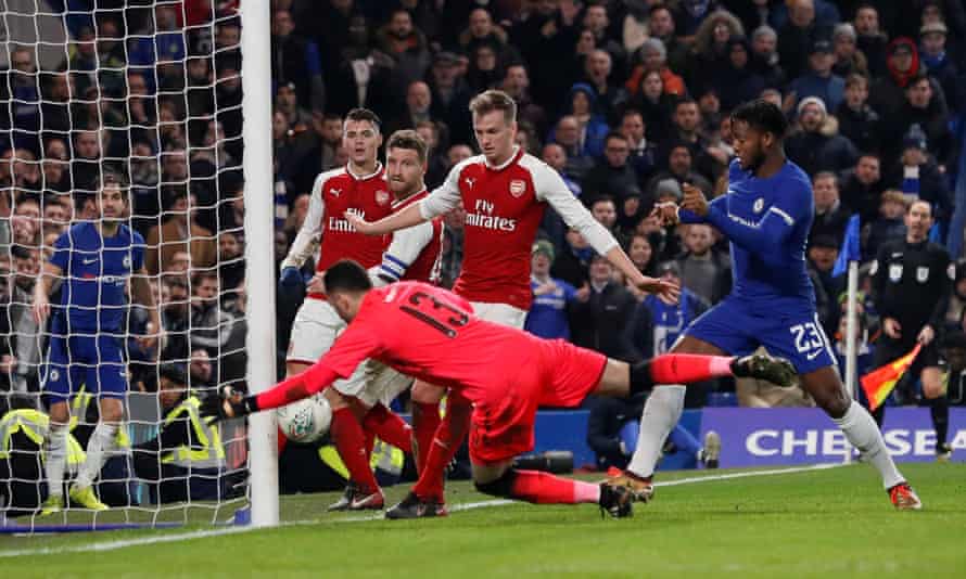 Chelsea’s Michy Batshuayi, Arsenal’s Rob Holding, David Ospina, Shkodran Mustafi and Granit Xhaka look on as the ball hits the upright.