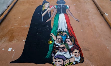 A mural painted by a street artist shows Giorgia Meloni and other Italian politicians in Rome.
