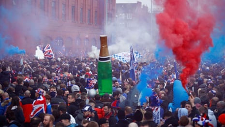 Rangers fans celebrate Scottish title at Ibrox despite Covid rules – video
