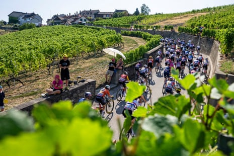 The peloton passes through the village of Bougy-Villars