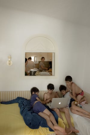 Minecrafting, 2016 Hania Farrell: ‘Minecrafting is a group portrait shot with no stage directions, capturing the spontaneity of everyday gestures in a painterly framed image. The subjects are immersed in their activities in two separate yet interconnected spaces, their gaze away from camera, with the women intent in kitchen chores and the children playing a video game. Minecrafting is ultimately a portrayal of contemporary modes of being together - separate yet connected - during leisure time’