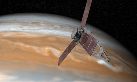 An artist’s rendering of Nasa’s Juno spacecraft making one of its close passes over Jupiter