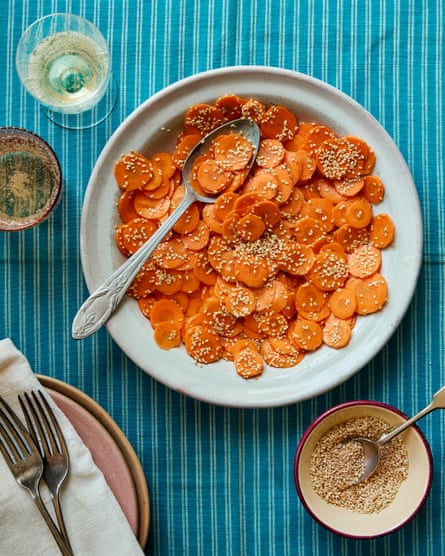 Alexina Anatole’s addictive carrots. On a plate or at least a shallow bowl. Loads of sesame seeds on them.