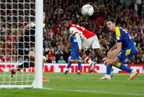 Eddie Nketiah scores the third for Arsenal.