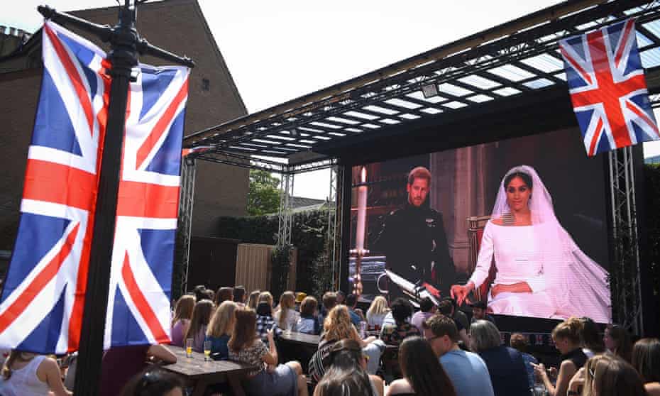 The wedding of Prince Harry and Meghan Markle shown on a big screen at an Edinburgh pub.