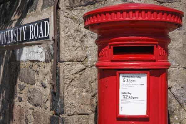 Red mailbox at the corner of the campusTypical United Kingdom mailbox