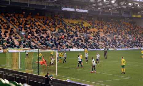 A socially distanced, restricted, crowd watch Norwich take on Cardiff in December 2020