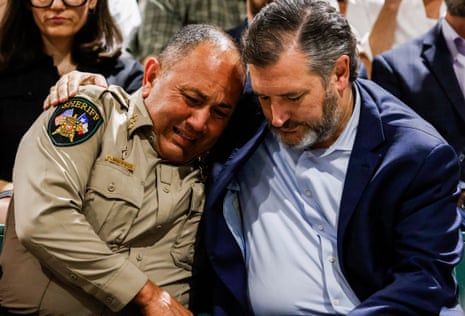 Nolasco is comforted by US Senator Ted Cruz of Texas at the Uvadle County Fairplex.