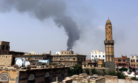 Smoke rises from a food factory in the Yemeni capital, Sanaa