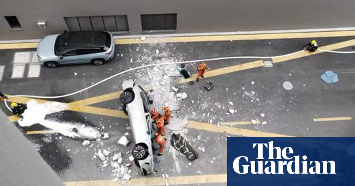 Two killed after Chinese electric car falls from third floor of company’s offices