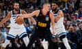 Nikola Jokic sees off the attentions of Rudy Gobert and Karl-Anthony Towns