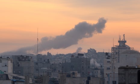 Smoke billows from buildings