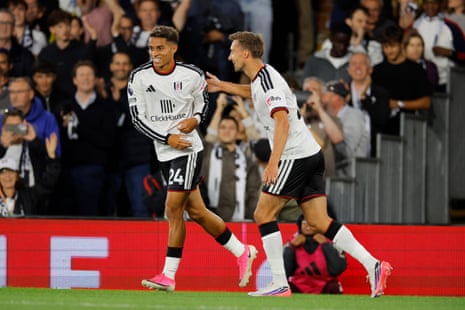 Josh King celebrates scoring.