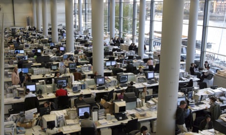 People in a large open plan office